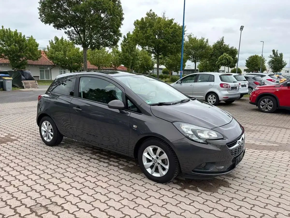 Gebraucht Opel Corsa drive 69 PS (50 kW) 2016 Plat.anthr./rogrey/0j:silbergr Kleinwagen