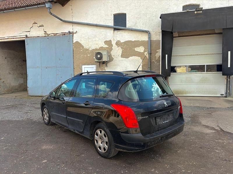 Gebraucht Peugeot 308 SW 111 PS (81 kW) 2011 Schwarz Kombi