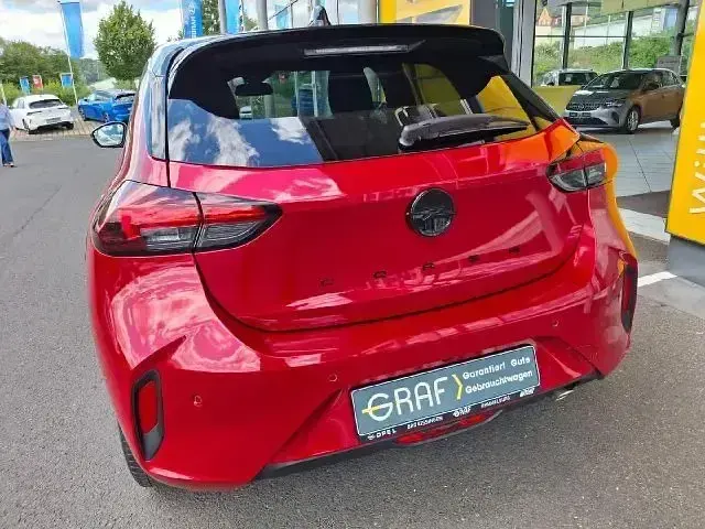 Gebraucht Opel Corsa 101 PS (74 kW) 2023 Peperoncino/schwarz Kleinwagen