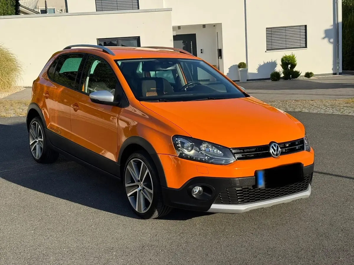 Gebraucht VW Polo Cross Highline 105 PS (77 kW) 2011 Orange Kleinwagen