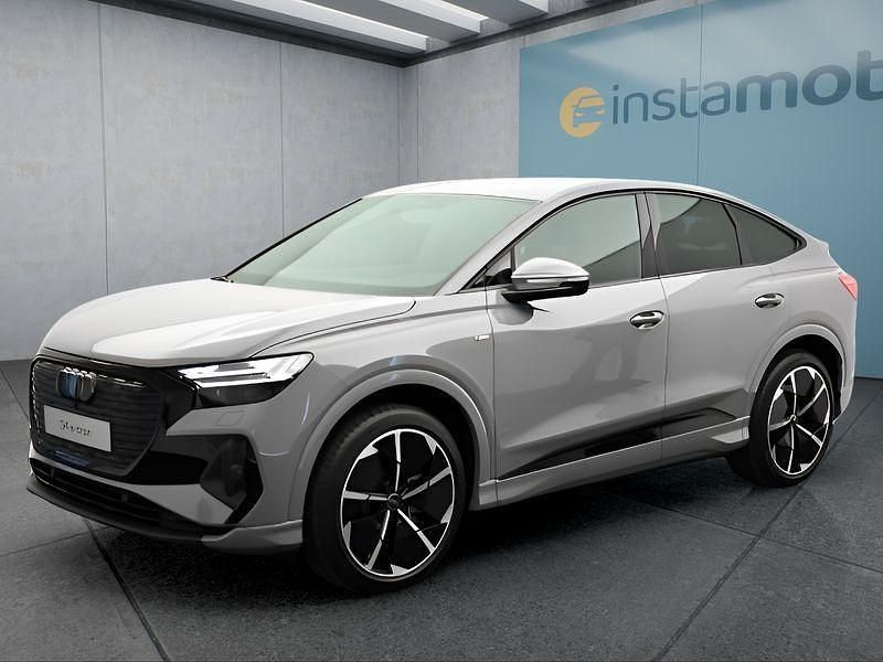 Grau Gebraucht 2024 Audi Q4 e-tron SUV | 53.049 € - Bild 1/1