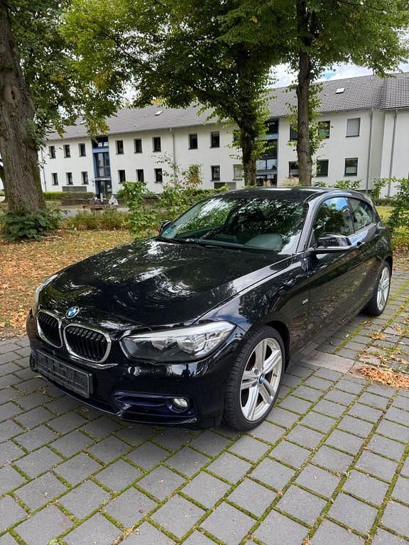 Schwarz Gebraucht 2016 BMW 118 Sport Line Kleinwagen | 10.700 € (Guter Preis) - Bild 1/4