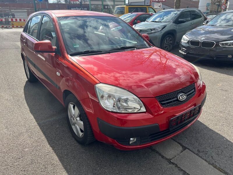 Tropenrot met. Gebraucht 2007 Kia Rio 2 Limousine | 1.999 € (Fairer Preis) - Bild 1/4