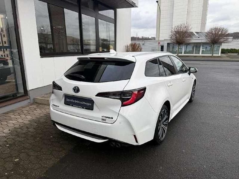 Gebraucht Toyota Corolla Hybrid Team 196 PS (144 kW) 2021 Weiß Kombi