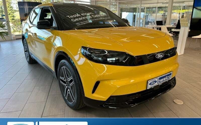 Vivid yellow Neu 2025 Ford Capri Premium SUV | 54.900 € (Fairer Preis) - Bild 1/4