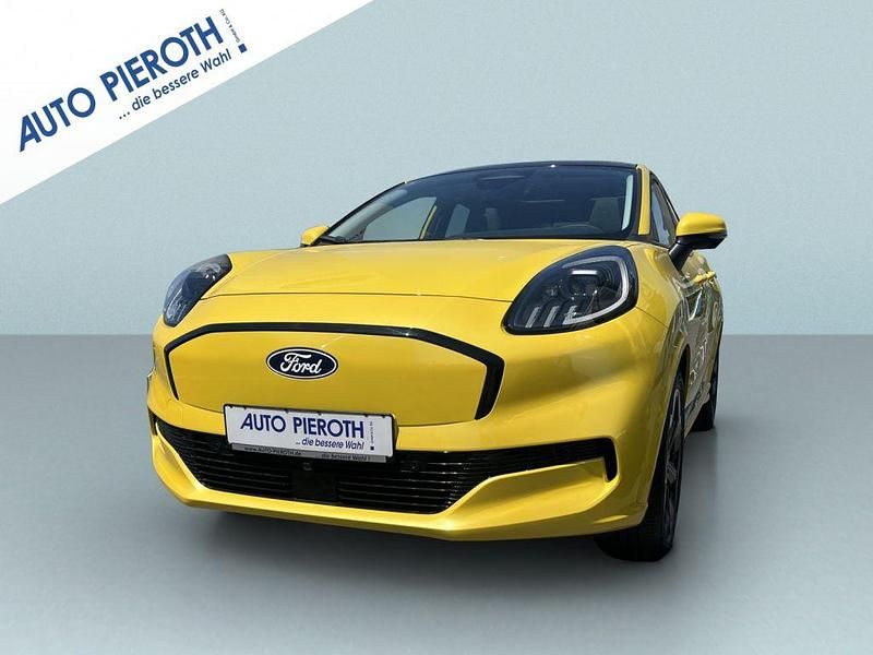 Electric yellow metallic Neu 2025 Ford Puma Gen-E Premium SUV | 37.950 € - Bild 1/2