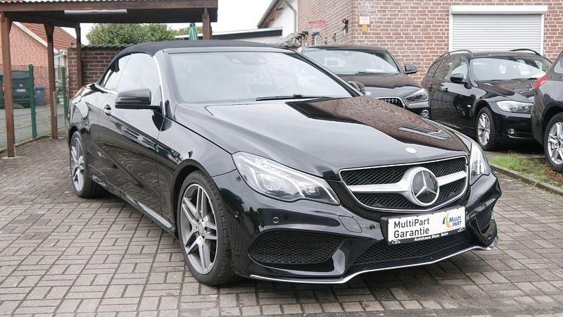 Obsidianschwarz (metallic) Gebraucht 2014 Mercedes E250 AMG line Cabrio | 21.700 € (Etwas zu teuer) - Bild 1/4