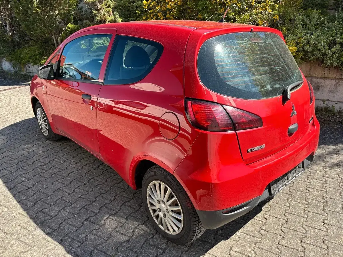 Gebraucht Mitsubishi Colt Basis 75 PS (55 kW) 2009 Rot Kleinwagen