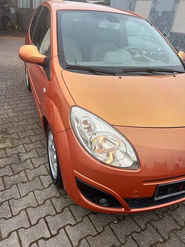 Orange Gebraucht 2007 Renault Twingo Initiale Kleinwagen | 3.999 € - Bild 1/4