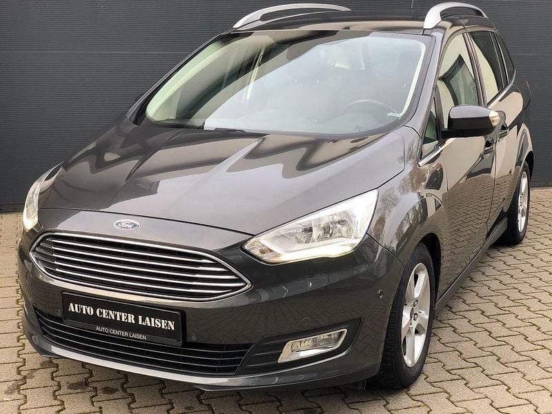 Grau Gebraucht 2016 Ford Grand C-Max Titanium Van / Kleinbus | 9.799 € (Fairer Preis) - Bild 1/4
