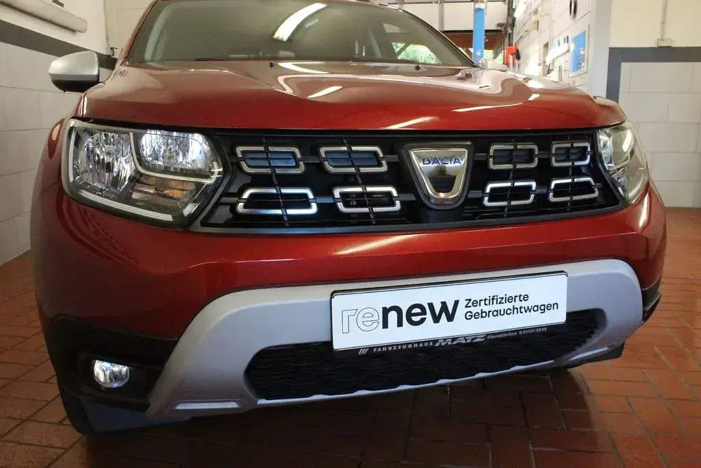 Używany Dacia Duster 131 KM (96 kW) 2021 Czerwony SUV