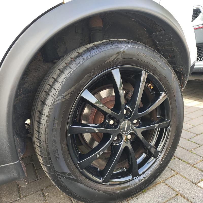 Second-hand Nissan Juke 117 CP (86 kW) 2011 Alb SUV