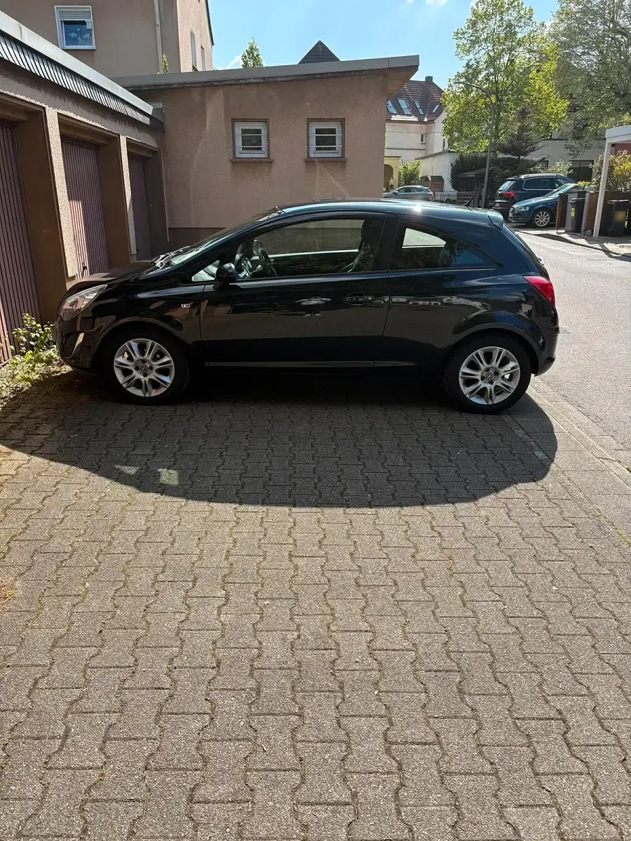 Gebraucht Opel Corsa 101 PS (74 kW) 2013 Schwarz Kleinwagen