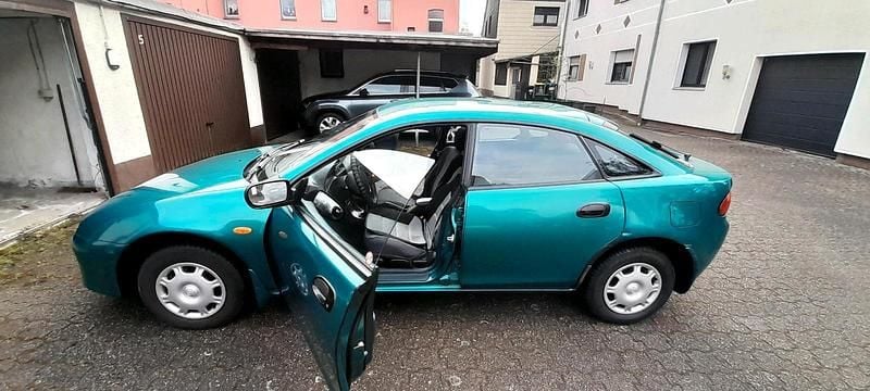 Gebraucht Mazda 323 88 PS (64 kW) 1995 Grün Limousine