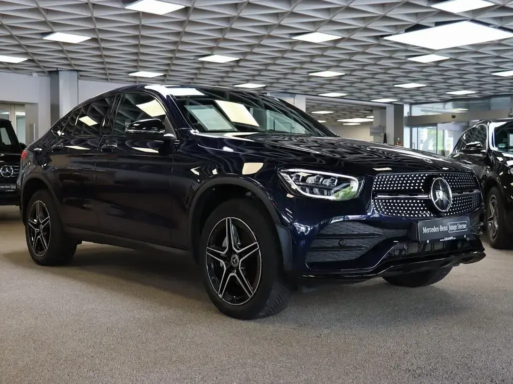 Gebraucht Mercedes GLC300de AMG 194 PS (142 kW) 2023 Cavansitblau metallic Coupé