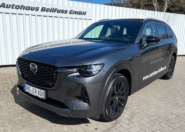 Grau Gebraucht 2024 Mazda CX-80 Homura-Line SUV | 55.950 € (Etwas zu teuer) - Bild 1/4