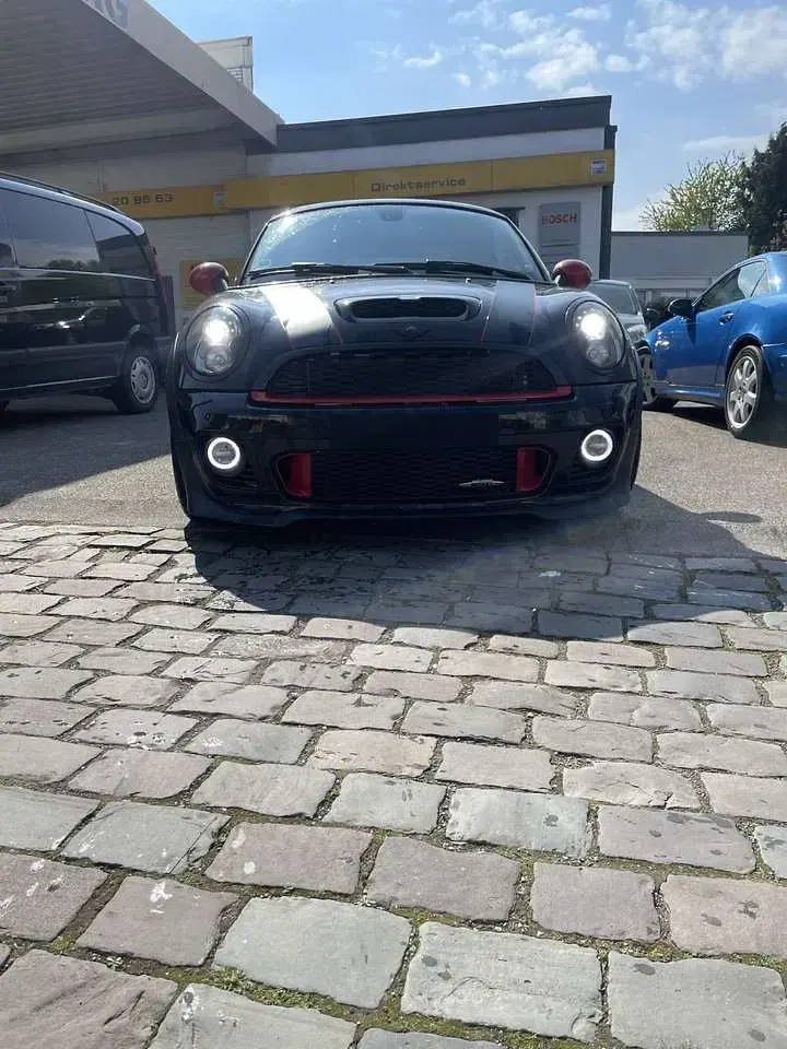 Gebraucht Mini John Cooper Works 211 PS (155 kW) 2011 Schwarz Kleinwagen
