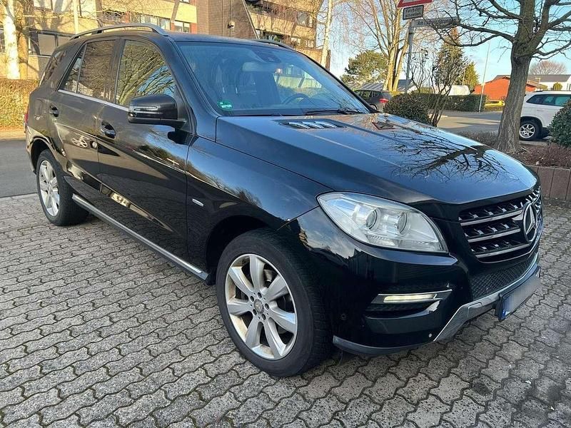 Schwarz Gebraucht 2012 Mercedes ML250 SUV | 12.700 € - Bild 1/4