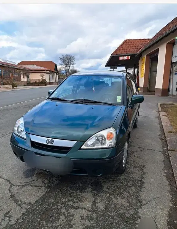 Gebraucht Suzuki Liana 103 PS (75 kW) 2001 Grün Limousine