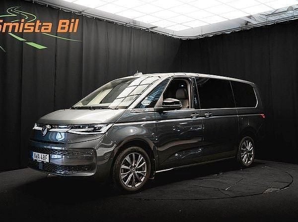 Grau Gebraucht 2024 VW Multivan Van | 58.499 € (Teuer) - Bild 1/4