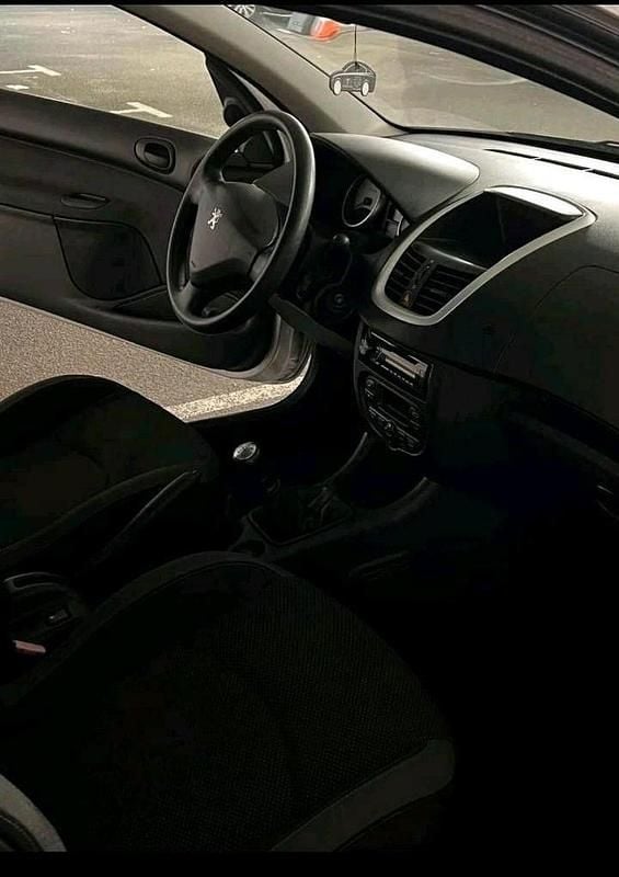 Gebraucht Peugeot 206+ 2011 Rot Kleinwagen