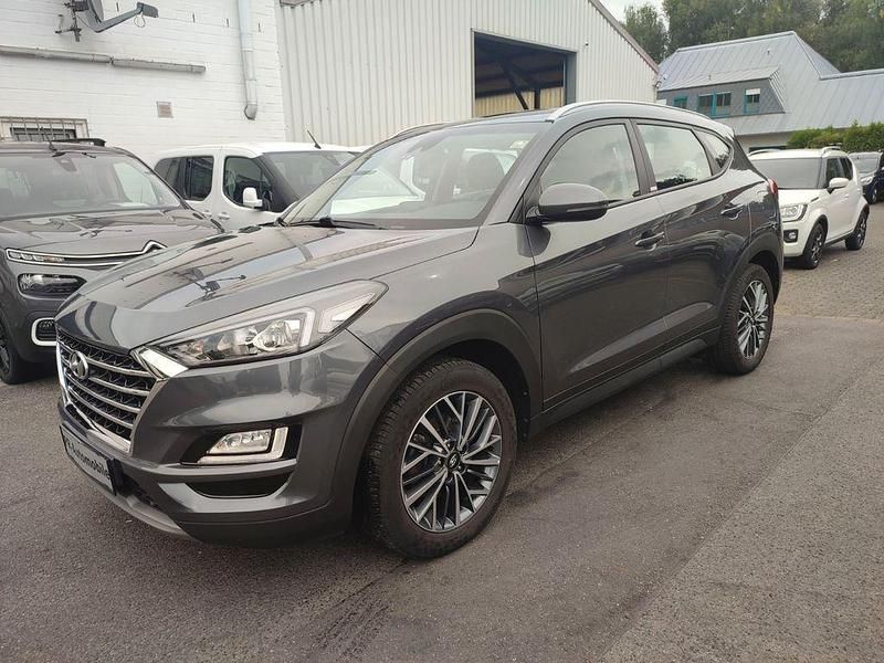 Grau Gebraucht 2020 Hyundai Tucson SUV | 20.999 € (Guter Preis) - Bild 1/4