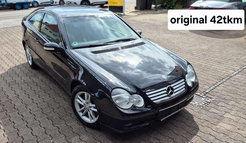 Obsidianschwarz metalliclack Gebraucht 2004 Mercedes C230 Coupé | 9.850 € - Bild 1/4