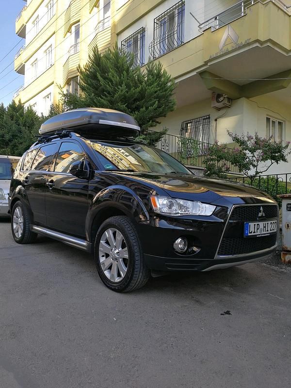Schwarz Gebraucht 2012 Mitsubishi Outlander SUV | 6.850 € (Fairer Preis) - Bild 1/3