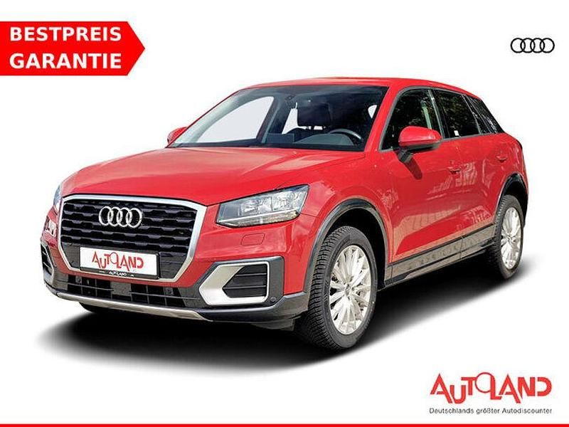 Tango red metallic (metallic) Gebraucht 2020 Audi Q2 Design SUV | 19.950 € (Fairer Preis) - Bild 1/4