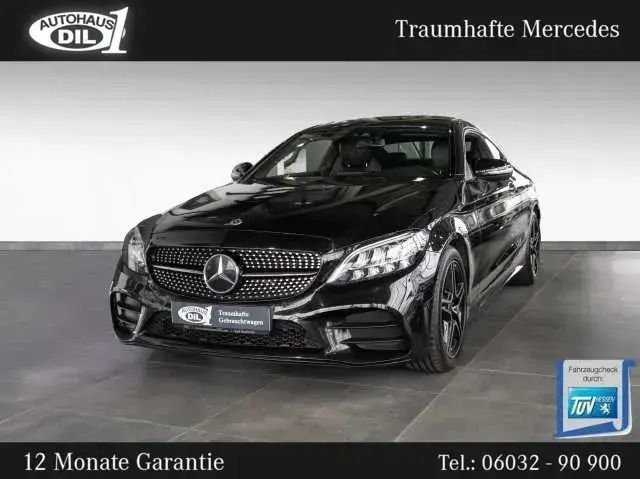 Schwarz (obsidianschwarz metalliclack) Gebraucht 2020 Mercedes C300 AMG Coupé | 32.650 € (Fairer Preis) - Bild 1/3