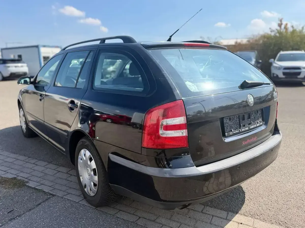 Gebraucht Skoda Octavia Ambiente 102 PS (75 kW) 2005 Schwarz magicperleffekt Kombi