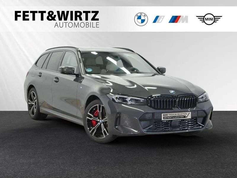 Bmw individual dravitgrau metallic Gebraucht 2024 BMW 330e M Sport Kombi | 52.799 € (Teuer) - Bild 1/3