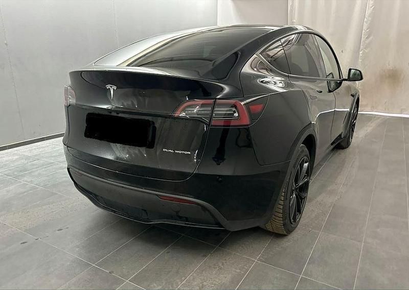 Gebraucht Tesla Model Y 378 kW (514 PS) 2023 Sonderlackierung schwarz SUV