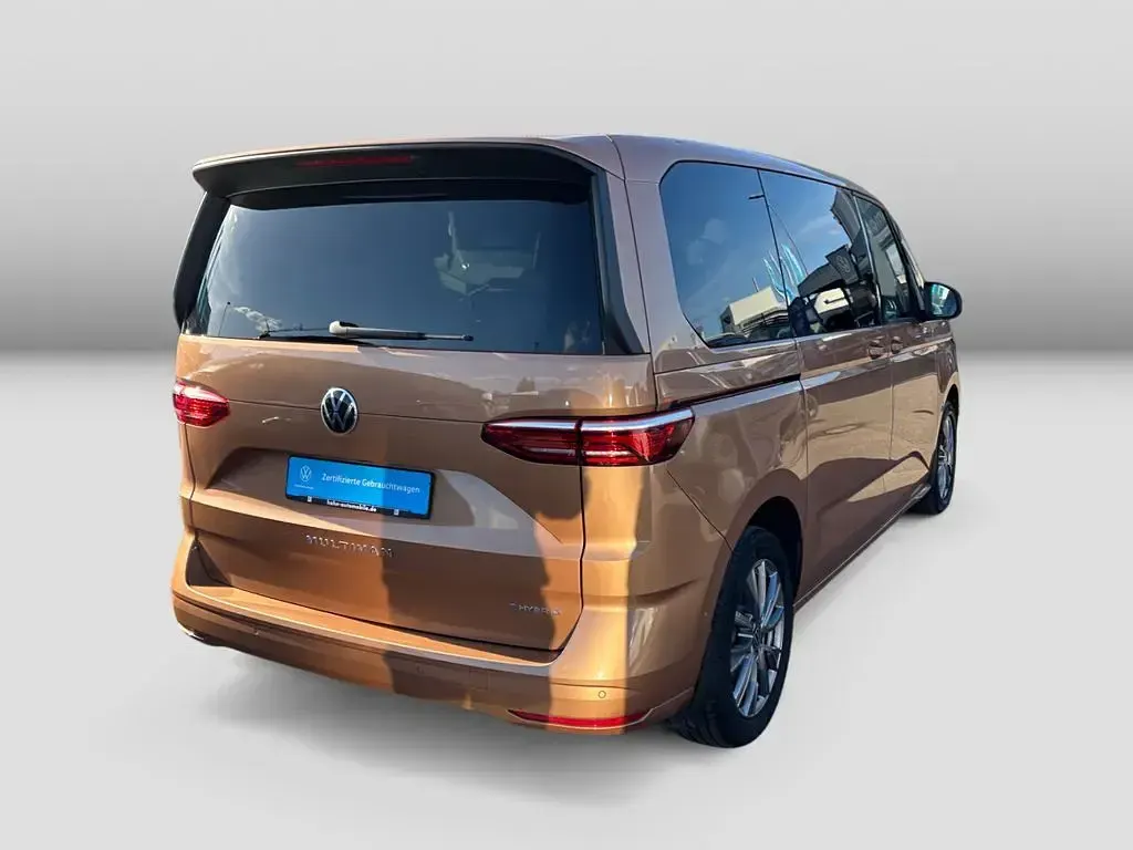 Używany VW Multivan Energetic 150 KM (110 kW) 2023 Pomarańczowy Minivan