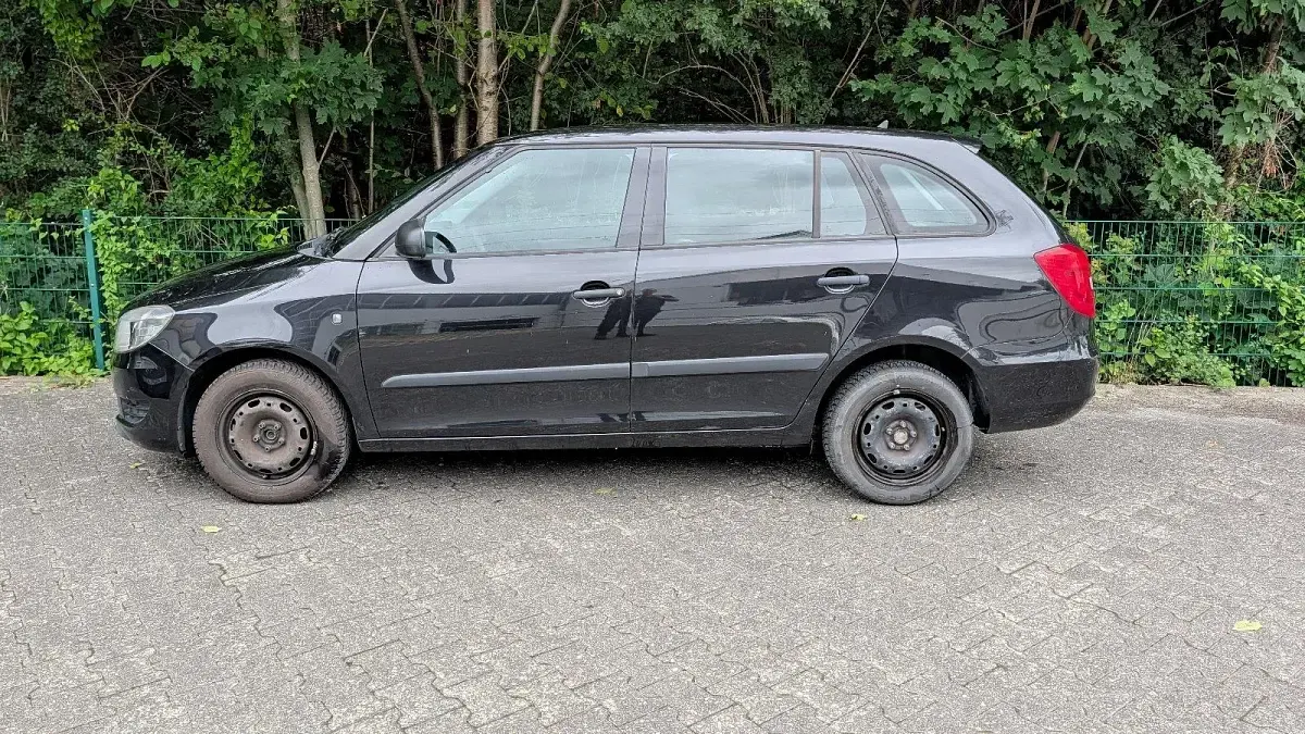 Gebraucht Skoda Fabia 69 PS (50 kW) 2011 Schwarz Kombi