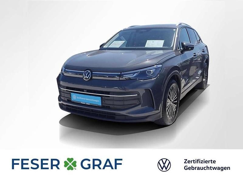 Delfingrau metallic Gebraucht 2024 VW Tiguan Life SUV | 33.940 € (Superpreis) - Bild 1/2