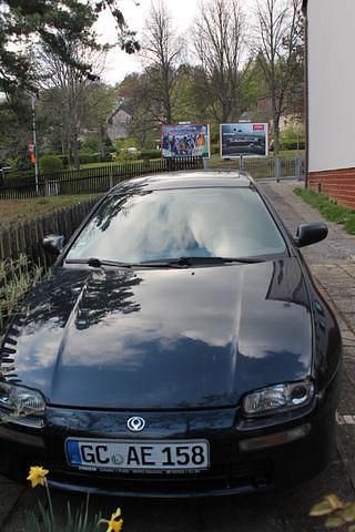 Gebraucht Mazda 323F 120 PS (88 kW) 1997 Grün metallic Limousine