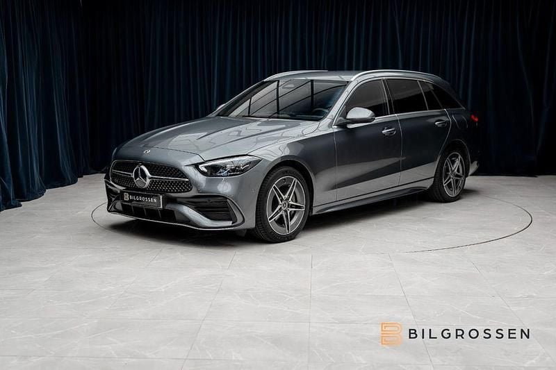 Grau Gebraucht 2022 Mercedes C300 AMG line SUV | 37.247 € - Bild 1/4