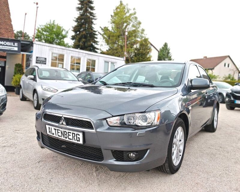 Effektgrau (p) Gebraucht 2012 Mitsubishi Lancer Limousine | 4.490 € (Fairer Preis) - Bild 1/4