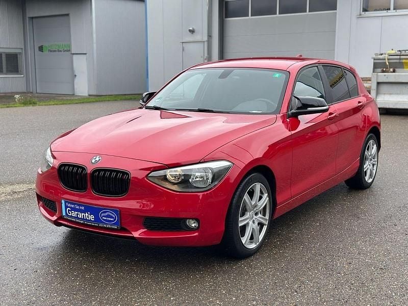 Rot Gebraucht 2012 BMW 116 Sport Line Kleinwagen | 3.999 € (Superpreis) - Bild 1/4