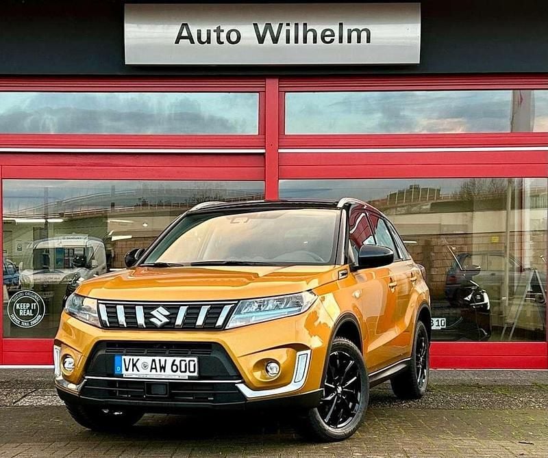 Solar/cosmic black pearl Gebraucht 2024 Suzuki Vitara Comfort SUV | 22.490 € (Superpreis) - Bild 1/4