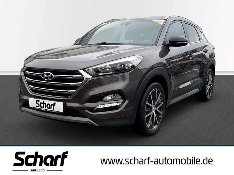 Bronze Gebraucht 2018 Hyundai Tucson Passion Plus SUV | 16.590 € (Fairer Preis) - Bild 1/4