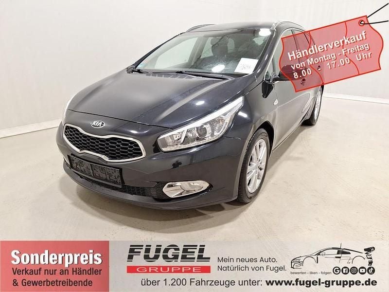 (1k) zilinaschwarz met. Gebraucht 2014 Kia Ceed Sportswagon DREAM-TEAM Edition Kombi | 3.869 € (Superpreis) - Bild 1/4