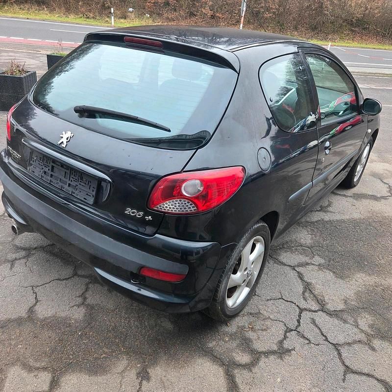 Gebraucht Peugeot 206+ 75 PS (55 kW) 2009 Schwarz Kleinwagen