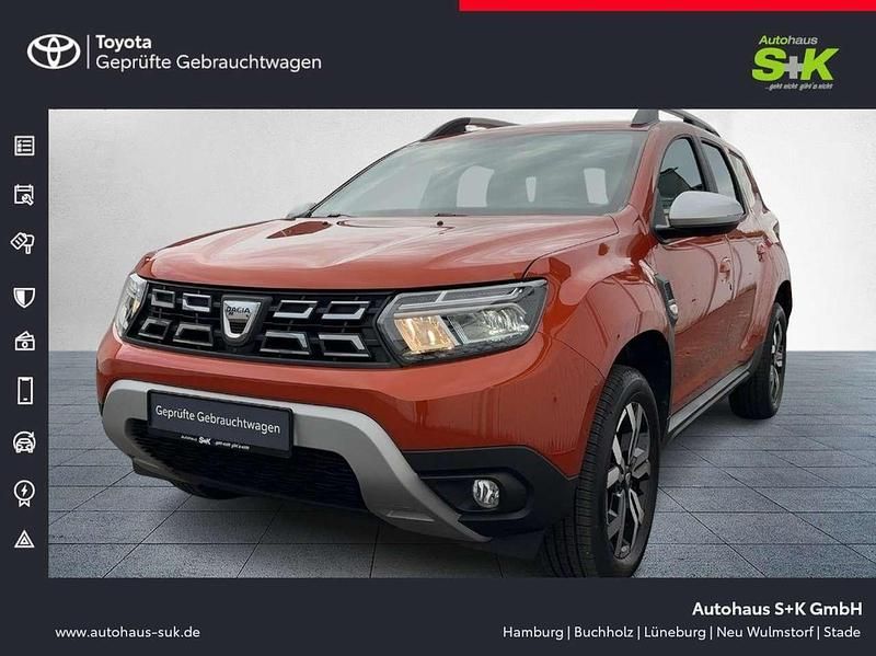 Arizonaorange (orange) Gebraucht 2021 Dacia Duster Prestige SUV | 16.890 € (Fairer Preis) - Bild 1/2