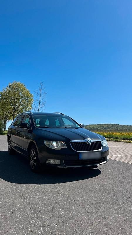 Second-hand Skoda Superb 170 CP (125 kW) 2013 Negru Break