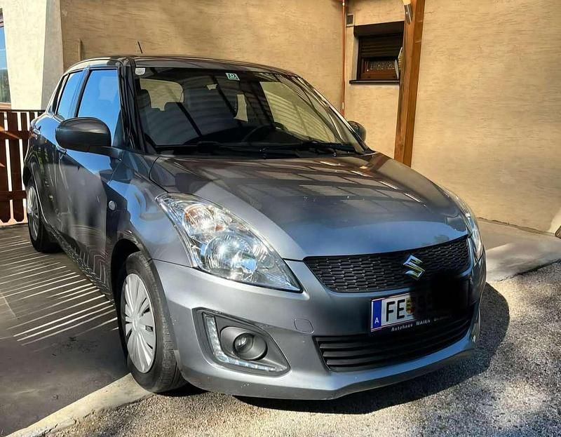 Grau Gebraucht 2016 Suzuki Swift Comfort Limousine | 6.500 € (Fairer Preis) - Bild 1/4