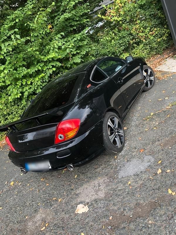 Schwarz Gebraucht 2004 Hyundai Coupé Coupé | 1.450 € (Fairer Preis) - Bild 1/4