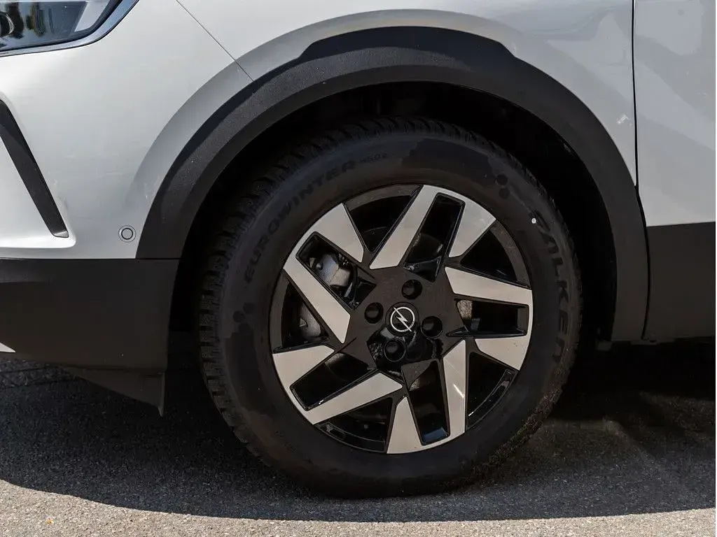 Gebraucht Opel Mokka-e Elegance 100 kW (136 PS) 2024 Weiss / banquise weiss SUV