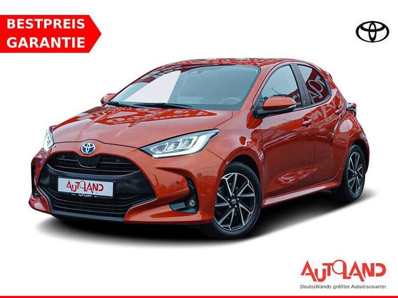 Orange metallic Gebraucht 2022 Toyota Yaris Hybrid Team Kleinwagen | 21.950 € (Etwas zu teuer) - Bild 1/4